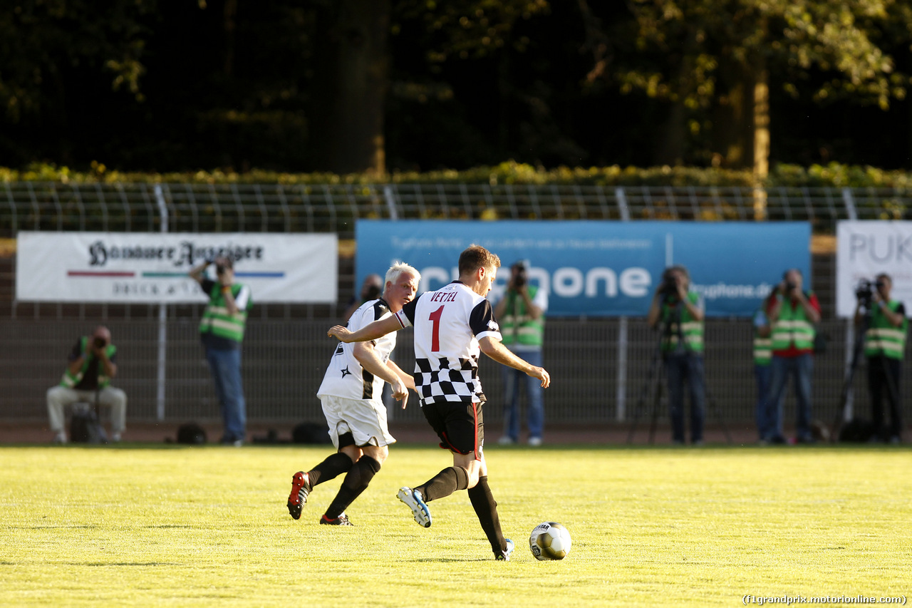 GP GERMANIA, Sebastian Vettel (GER) Red Bull Racing, Kick f¸r Kinder at Hanau. 
16.07.2014. Formula 1 World Championship, Rd 10, German Grand Prix, Hockenheim, Germany, Wednesday Soccer.