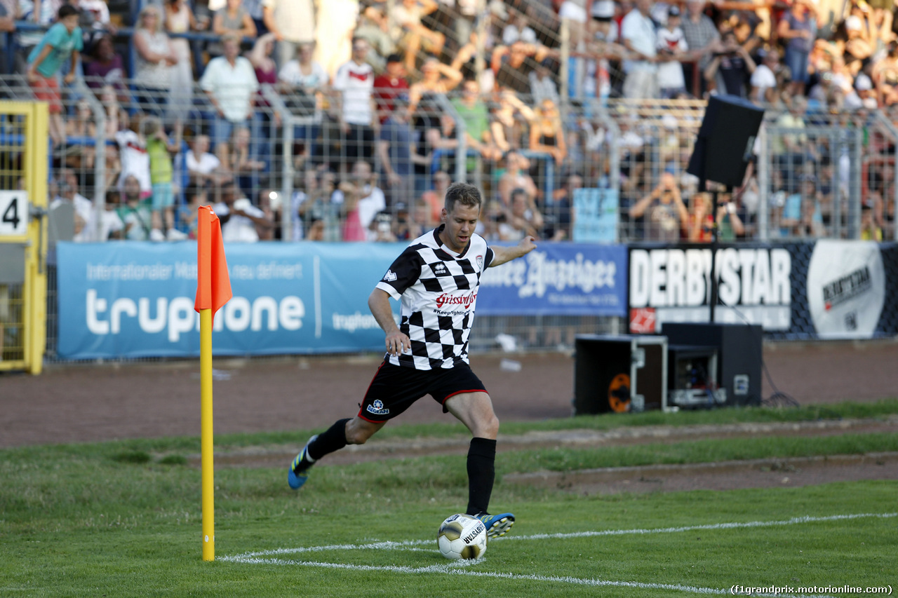 GP GERMANIA, Sebastian Vettel (GER) Red Bull Racing, Kick f¸r Kinder at Hanau. 
16.07.2014. Formula 1 World Championship, Rd 10, German Grand Prix, Hockenheim, Germany, Wednesday Soccer.