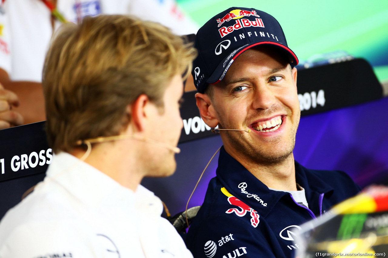 GP GERMANIA, (L to R): Nico Rosberg (GER) Mercedes AMG F1 e Sebastian Vettel (GER) Red Bull Racing in the FIA Press Conference.
17.07.2014. Formula 1 World Championship, Rd 10, German Grand Prix, Hockenheim, Germany, Preparation Day.