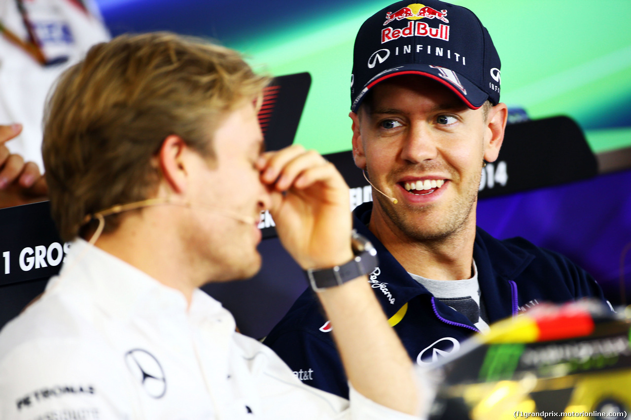 GP GERMANIA, (L to R): Nico Rosberg (GER) Mercedes AMG F1 e Sebastian Vettel (GER) Red Bull Racing in the FIA Press Conference.
17.07.2014. Formula 1 World Championship, Rd 10, German Grand Prix, Hockenheim, Germany, Preparation Day.