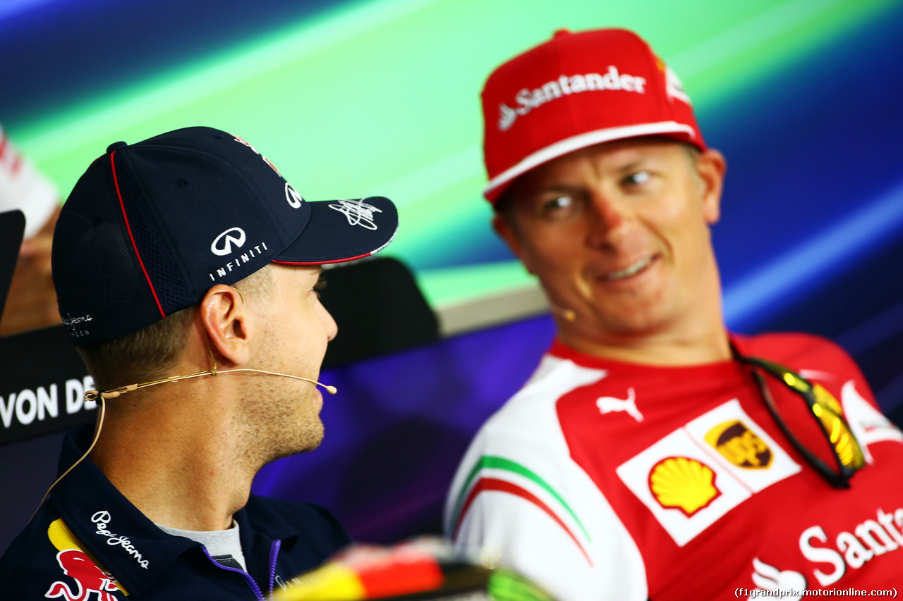GP GERMANIA, (L to R): Sebastian Vettel (GER) Red Bull Racing e Kimi Raikkonen (FIN) Ferrari in the FIA Press Conference.
17.07.2014. Formula 1 World Championship, Rd 10, German Grand Prix, Hockenheim, Germany, Preparation Day.