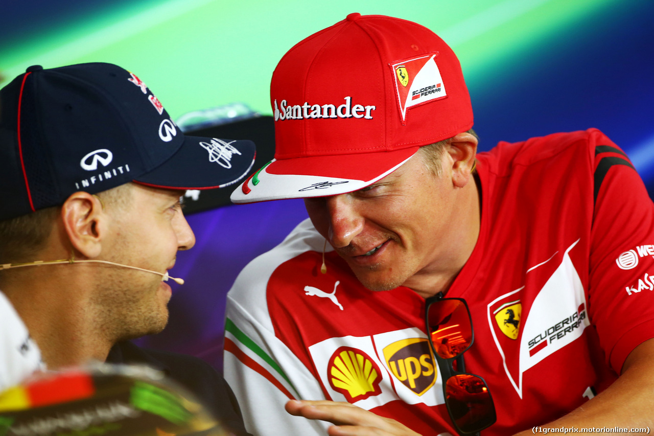 GP GERMANIA, (L to R): Sebastian Vettel (GER) Red Bull Racing e Kimi Raikkonen (FIN) Ferrari in the FIA Press Conference.
17.07.2014. Formula 1 World Championship, Rd 10, German Grand Prix, Hockenheim, Germany, Preparation Day.