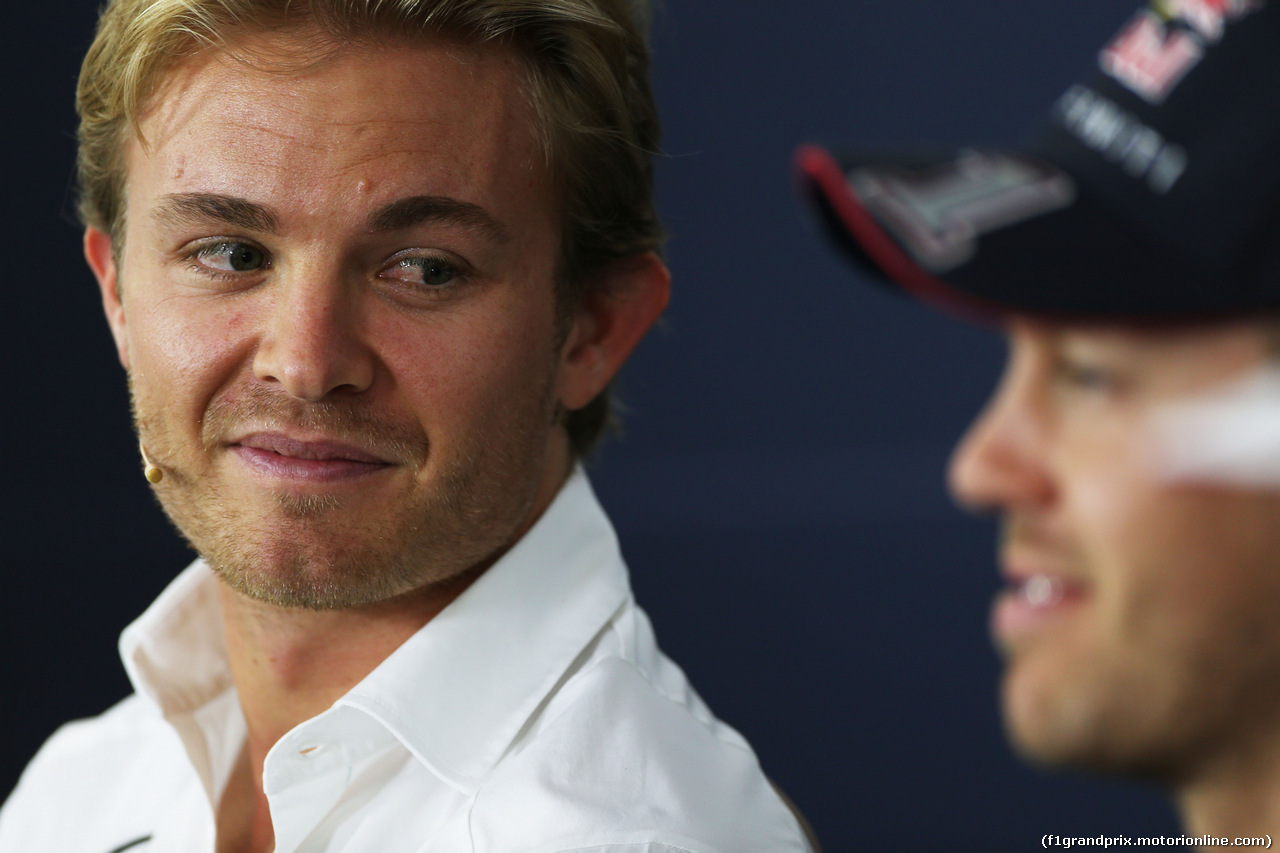 GP GERMANIA, (L to R): Nico Rosberg (GER) Mercedes AMG F1 e Sebastian Vettel (GER) Red Bull Racing in the FIA Press Conference.
17.07.2014. Formula 1 World Championship, Rd 10, German Grand Prix, Hockenheim, Germany, Preparation Day.