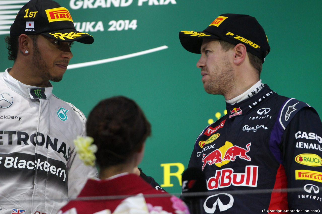 GP GIAPPONE, 05.10.2014 - Gara, 1st position Lewis Hamilton (GBR) Mercedes AMG F1 W05 e terzo Sebastian Vettel (GER) Red Bull Racing RB10