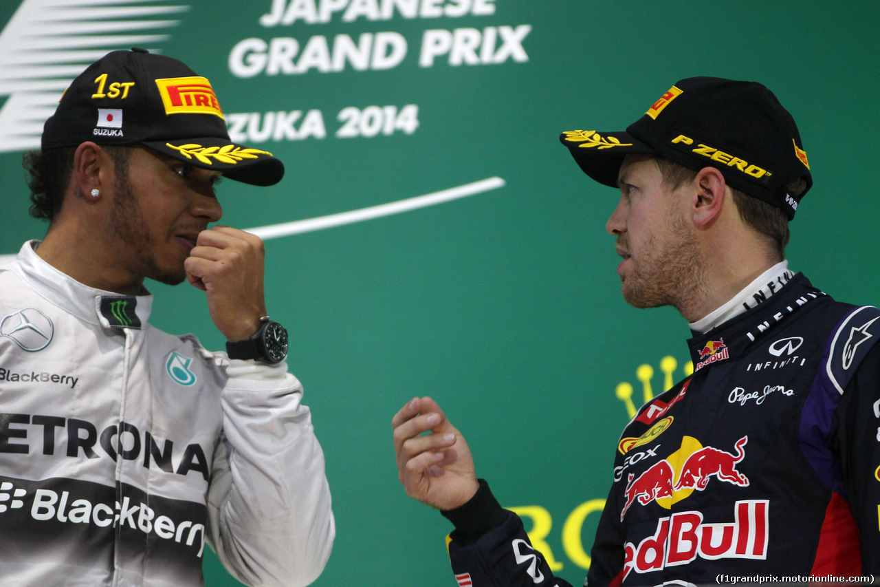 GP GIAPPONE, 05.10.2014 - Gara, 1st position Lewis Hamilton (GBR) Mercedes AMG F1 W05 e terzo Sebastian Vettel (GER) Red Bull Racing RB10