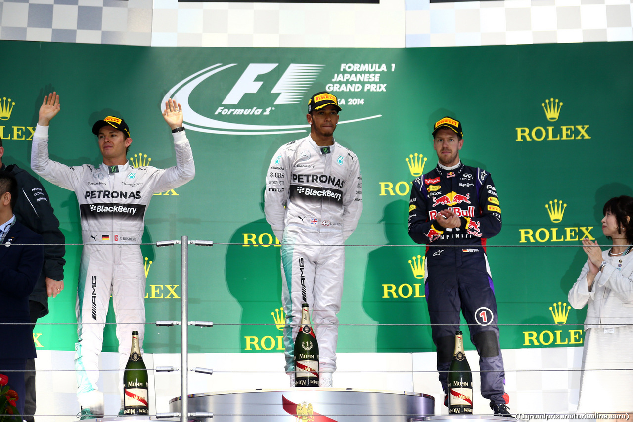 GP GIAPPONE, 05.10.2014 - Gara, 1st position Lewis Hamilton (GBR) Mercedes AMG F1 W05, secondo Nico Rosberg (GER) Mercedes AMG F1 W05 e terzo Sebastian Vettel (GER) Red Bull Racing RB10