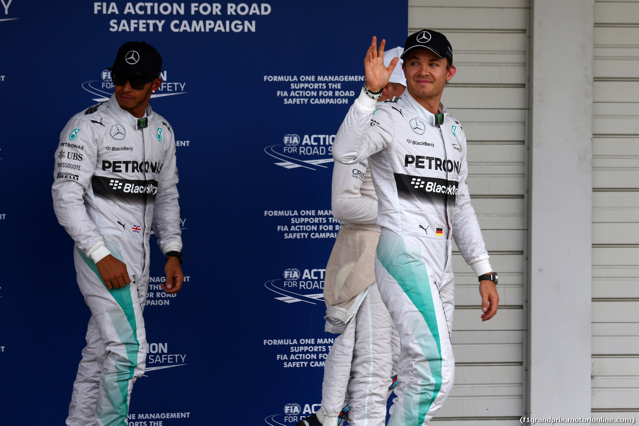 GP GIAPPONE, 04.10.2014 - Qualifiche, secondo Lewis Hamilton (GBR) Mercedes AMG F1 W05 e Nico Rosberg (GER) Mercedes AMG F1 W05 pole position