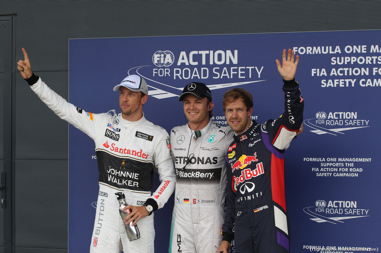 GP GRAN BRETAGNA, 04.07.2014 - Qualifiche, Nico Rosberg (GER) Mercedes AMG F1 W05 (pole position), Sebastian Vettel (GER) Infiniti Red Bull Racing RB10 (secondo) e Jenson Button (GBR) McLaren Mercedes MP4-29 (terzo)