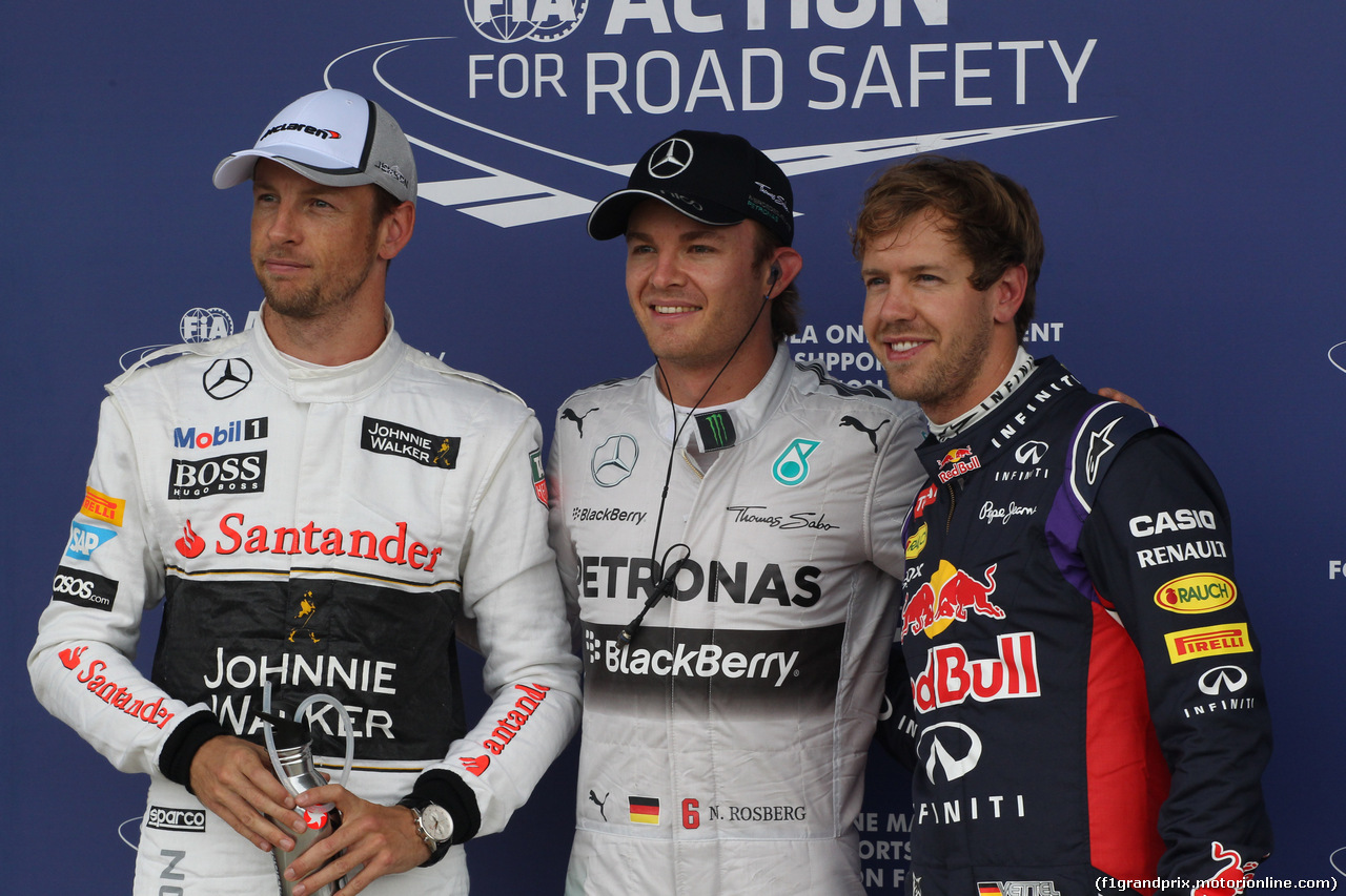GP GRAN BRETAGNA, 04.07.2014 - Qualifiche, Nico Rosberg (GER) Mercedes AMG F1 W05 (pole position), Sebastian Vettel (GER) Infiniti Red Bull Racing RB10 (secondo) e Jenson Button (GBR) McLaren Mercedes MP4-29 (terzo)