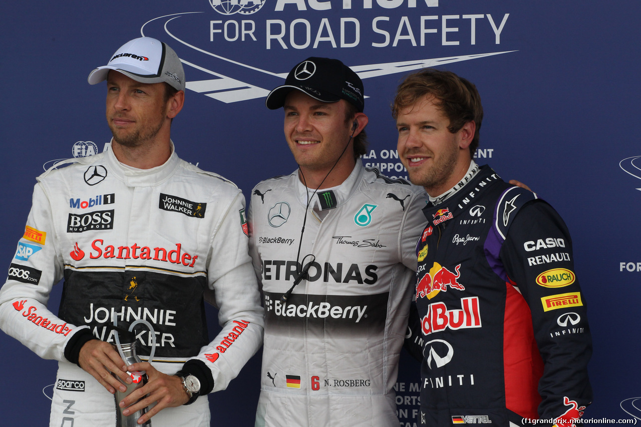 GP GRAN BRETAGNA, 04.07.2014 - Qualifiche, Nico Rosberg (GER) Mercedes AMG F1 W05 (pole position), Sebastian Vettel (GER) Infiniti Red Bull Racing RB10 (secondo) e Jenson Button (GBR) McLaren Mercedes MP4-29 (terzo)