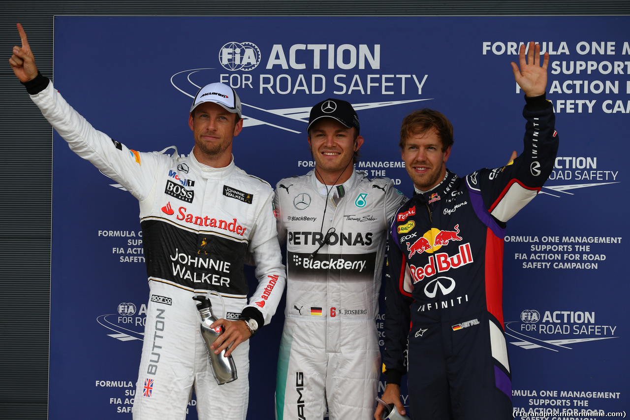 GP GRAN BRETAGNA, 04.07.2014 - Qualifiche, Nico Rosberg (GER) Mercedes AMG F1 W05 (pole position), Sebastian Vettel (GER) Infiniti Red Bull Racing RB10 (secondo) e Jenson Button (GBR) McLaren Mercedes MP4-29 (terzo)