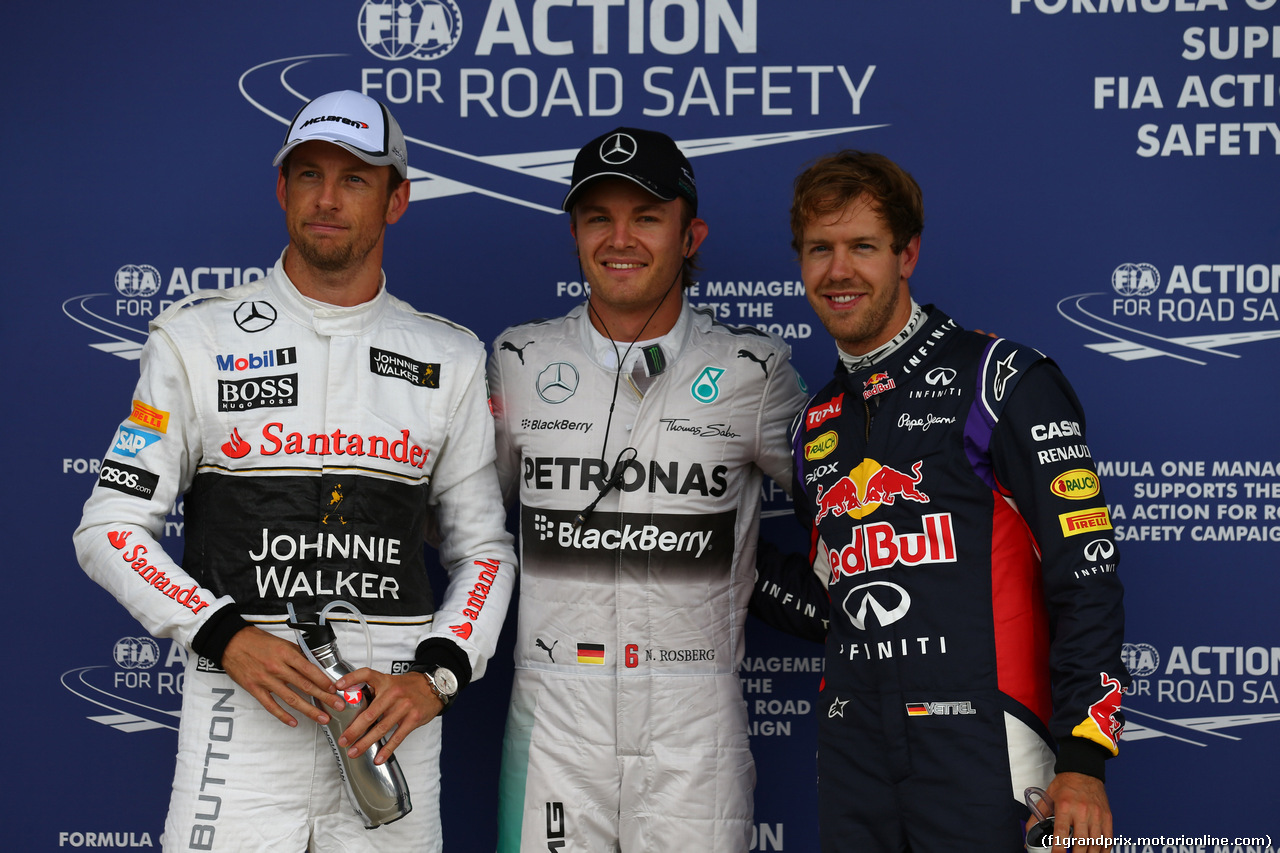 GP GRAN BRETAGNA, 04.07.2014 - Qualifiche, Nico Rosberg (GER) Mercedes AMG F1 W05 (pole position), Sebastian Vettel (GER) Infiniti Red Bull Racing RB10 (secondo) e Jenson Button (GBR) McLaren Mercedes MP4-29 (terzo)