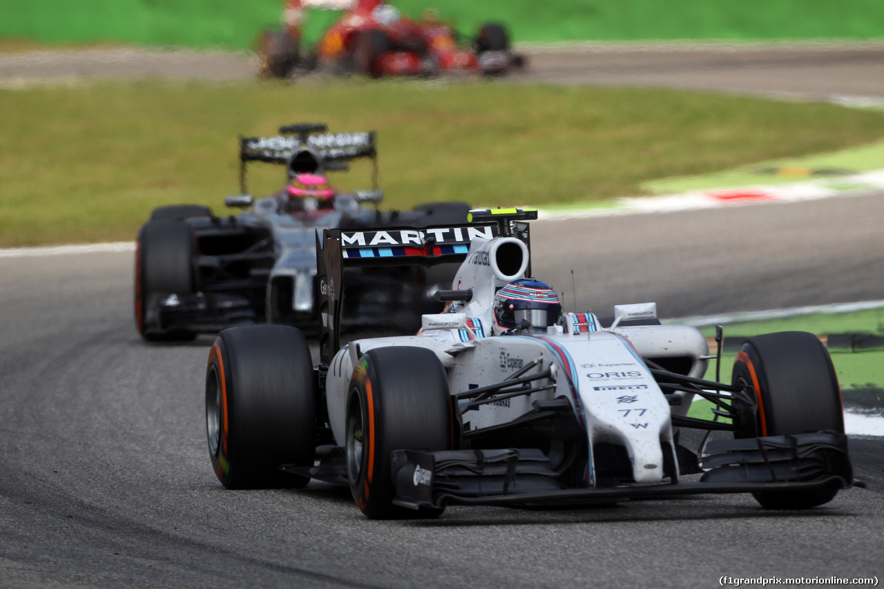 GP ITALIA, 07.09.2014 - Gara, Valtteri Bottas (FIN) Williams F1 Team FW36 davanti a Jenson Button (GBR) McLaren Mercedes MP4-29