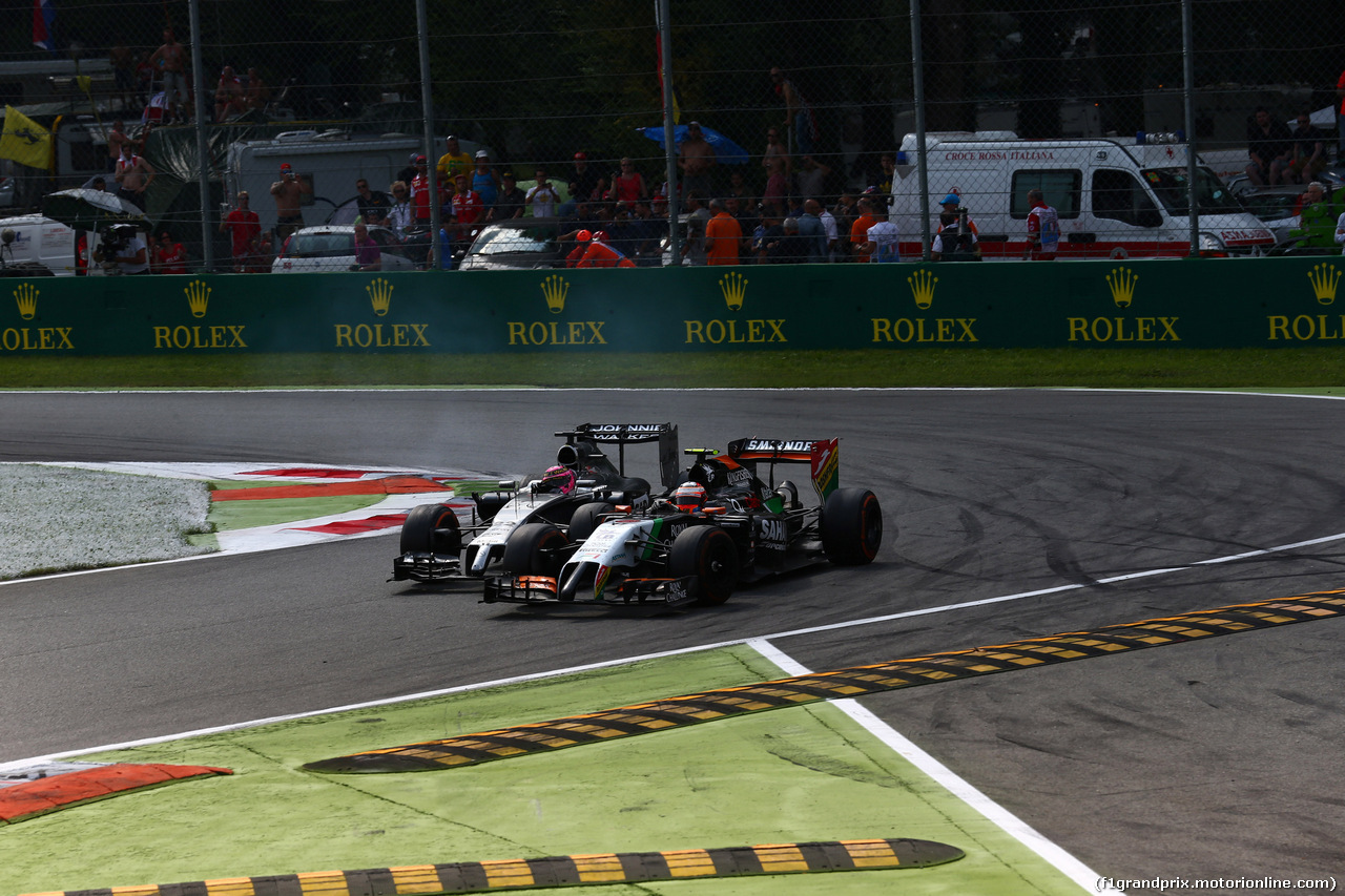 GP ITALIA, 07.09.2014 - Gara, Jenson Button (GBR) McLaren Mercedes MP4-29 e Sergio Perez (MEX) Sahara Force India F1 VJM07
