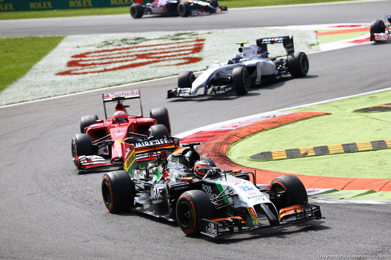 GP ITALIA, 07.09.2014 - Gara, Nico Hulkenberg (GER) Sahara Force India F1 VJM07 davanti a Kimi Raikkonen (FIN) Ferrari F14-T