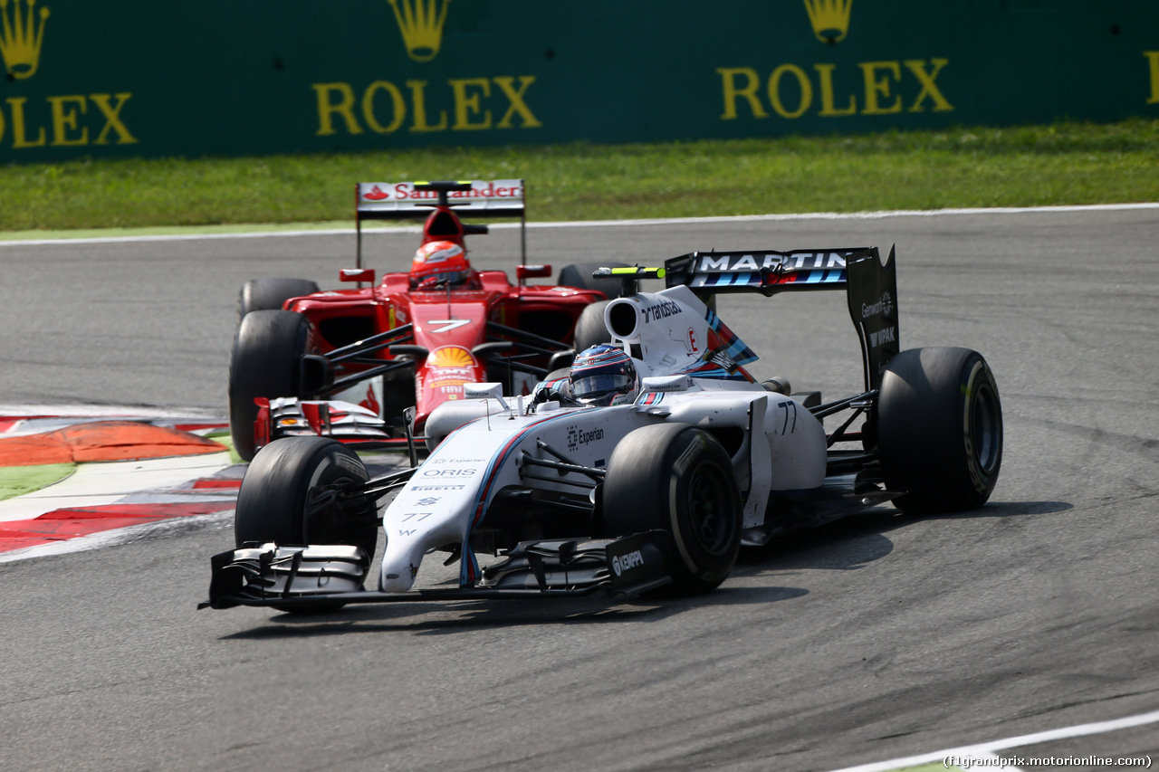 GP ITALIA, 07.09.2014 - Gara, Valtteri Bottas (FIN) Williams F1 Team FW36 e Kimi Raikkonen (FIN) Ferrari F14-T