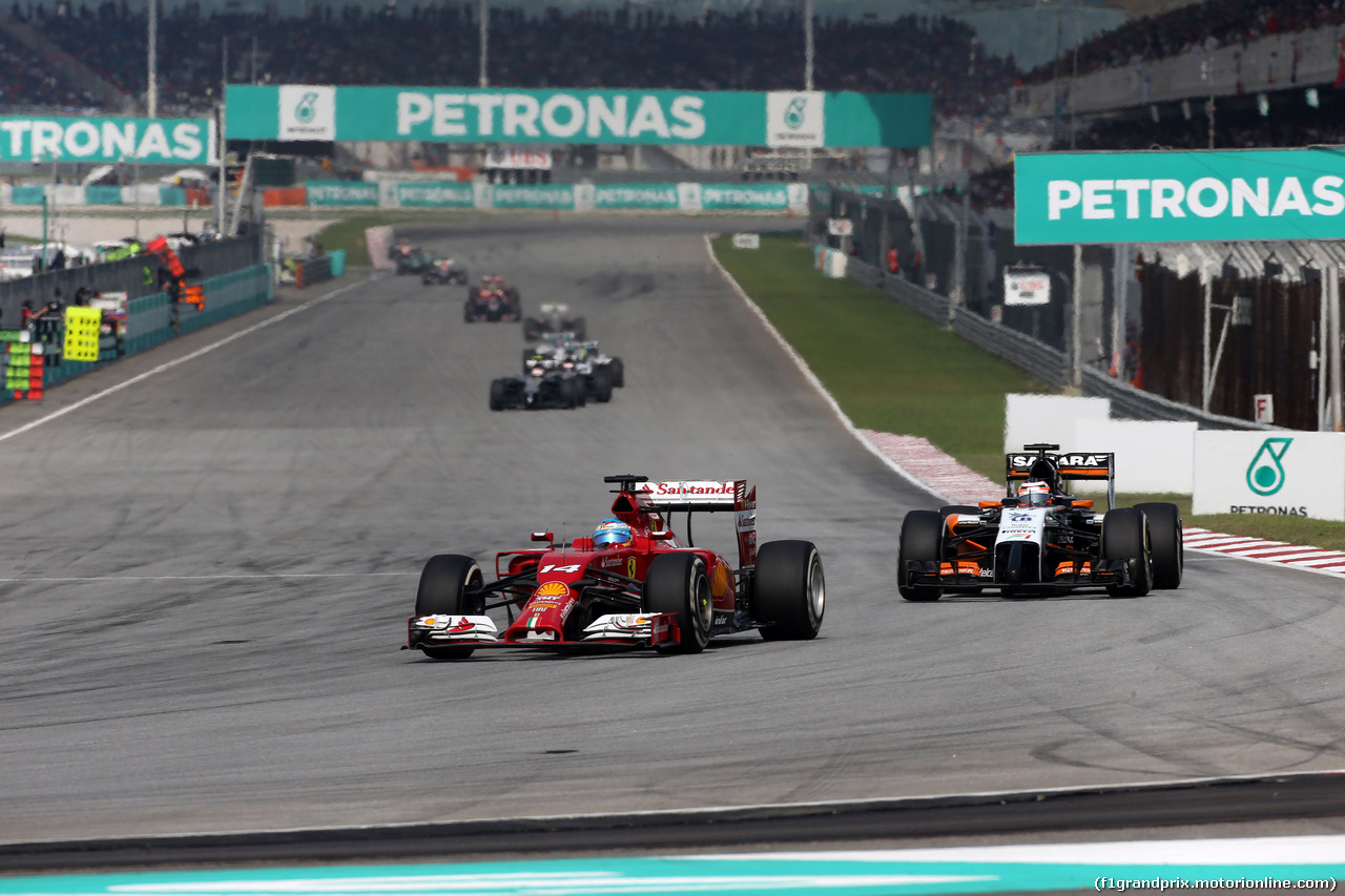 GP MALESIA, 30.03.2014 - Gara, Fernando Alonso (ESP) Ferrari F14-T davanti a Nico Hulkenberg (GER) Sahara Force India F1 VJM07