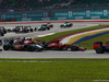 GP DE MALASIA, 30.03.2014 - Carrera, Inicio de la carrera, Kimi Raikkonen (FIN) Ferrari F14-T y Fernando Alonso (ESP) Ferrari F14-T