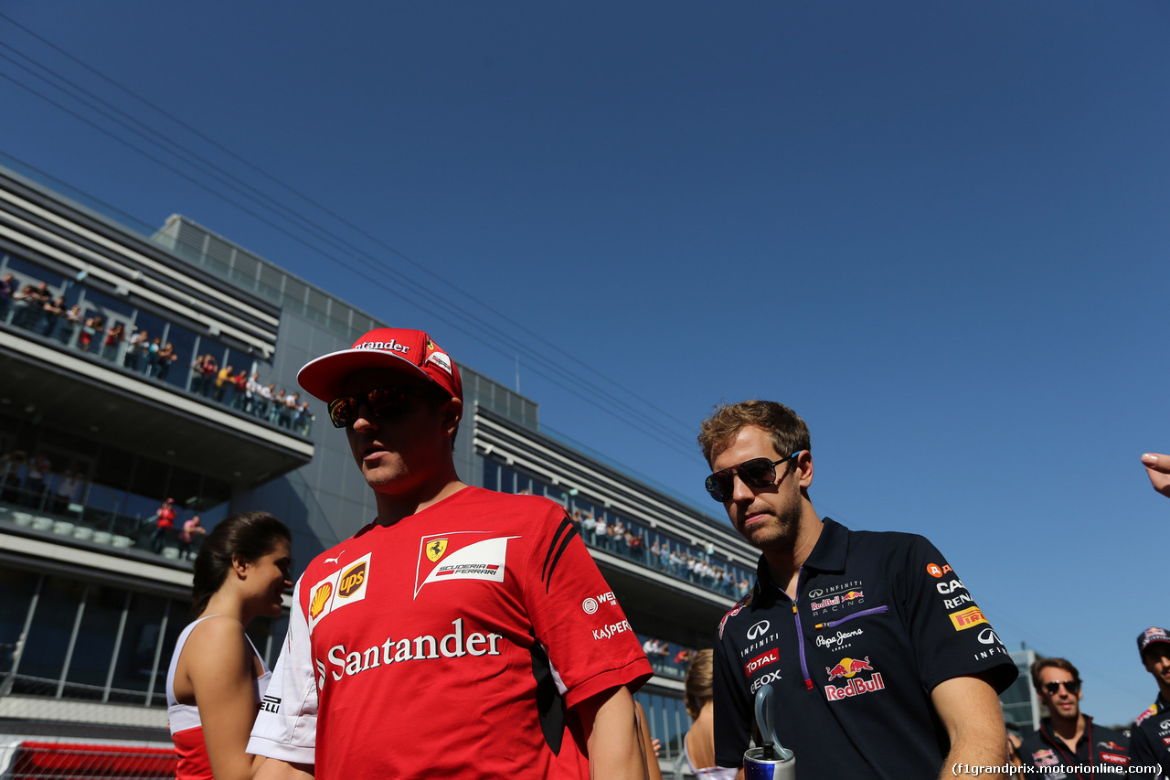 GP RUSSIA, 12.10.2014-   Kimi Raikkonen (FIN) Ferrari F14T e Sebastian Vettel (GER) Infiniti Red Bull Racing RB10