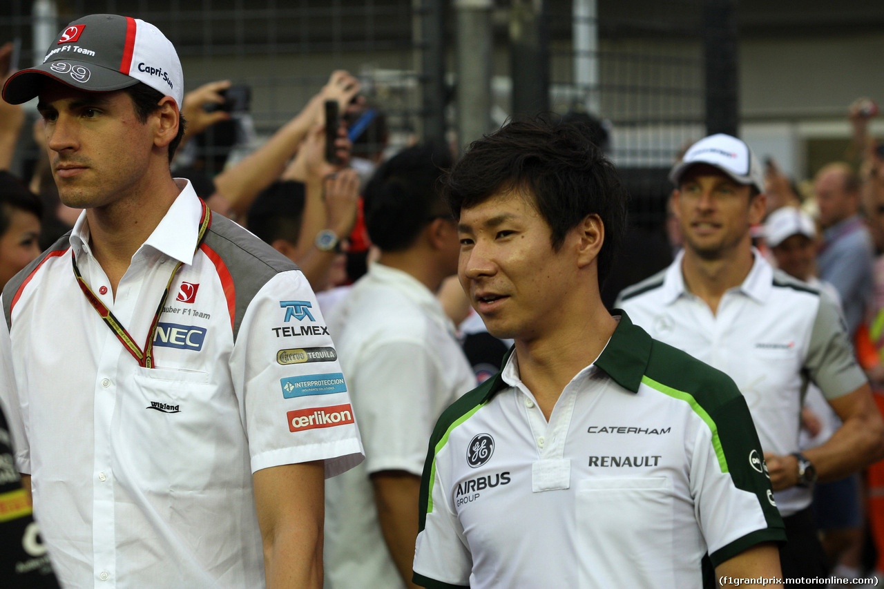GP SINGAPORE, 21.09.2014 - Adrian Sutil (GER) Sauber F1 Team C33 e Kamui Kobayashi (JAP) Caterham F1 Team CT-04