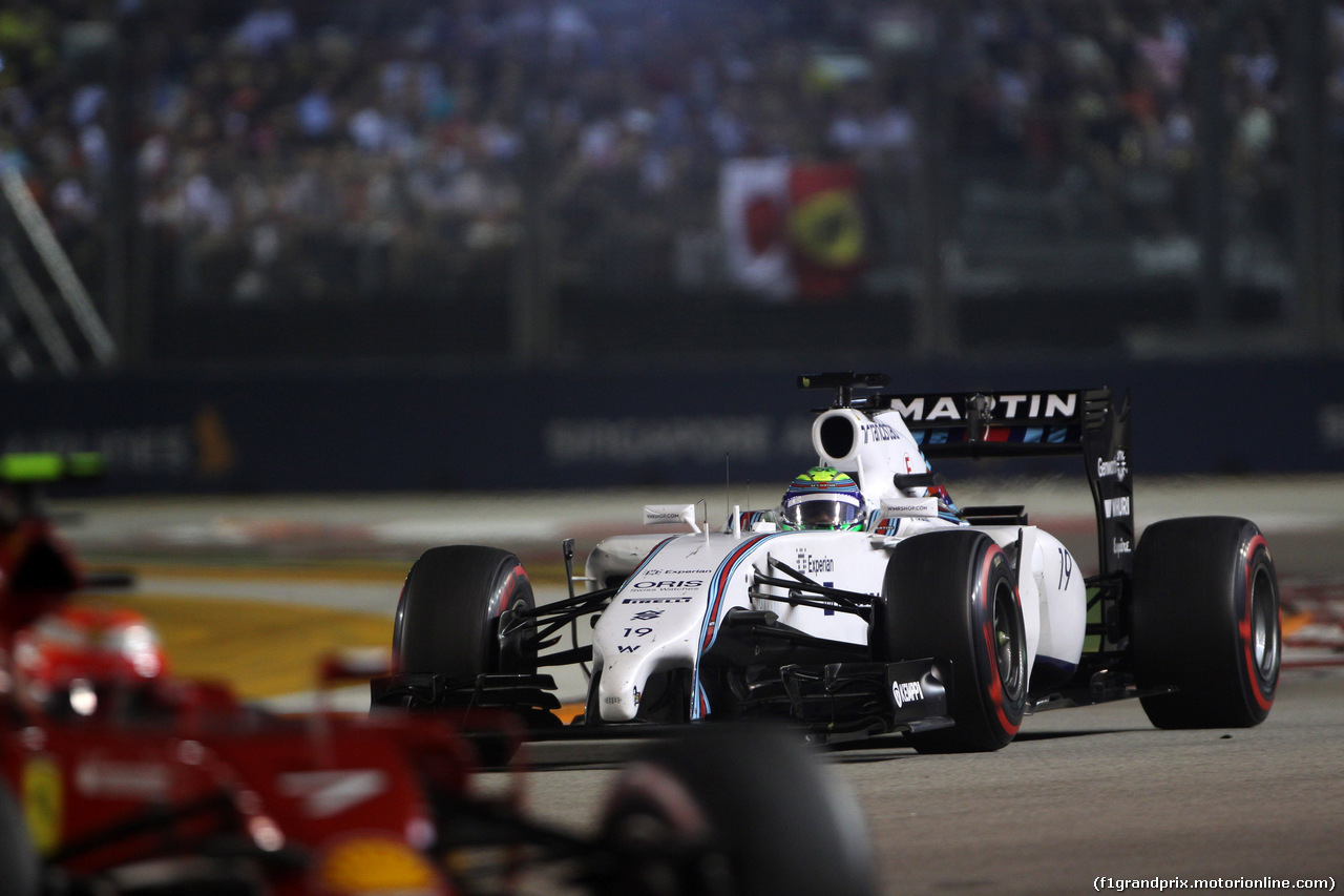 GP SINGAPORE, 21.09.2014 - Gara, Kimi Raikkonen (FIN) Ferrari F14-T e Felipe Massa (BRA) Williams F1 Team FW36