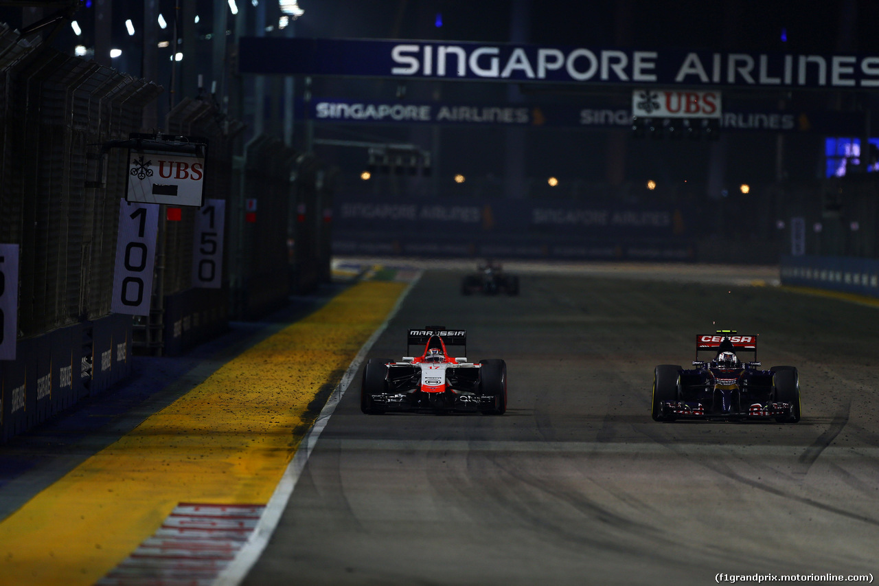 GP SINGAPORE, 21.09.2014 - Gara, Jules Bianchi (FRA) Marussia F1 Team MR03 e Daniil Kvyat (RUS) Scuderia Toro Rosso STR9
