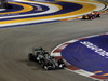 GP SINGAPORE, 21.09.2014 - Gara, Lewis Hamilton (GBR) Mercedes AMG F1 W05 davanti a Sebastian Vettel (GER) Red Bull Racing RB10