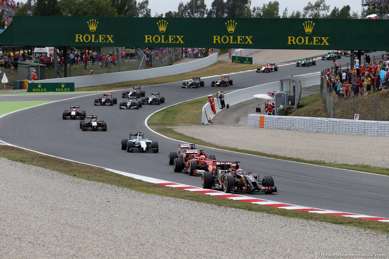 GP SPAGNA, 11.05.2014-  Gara, Romain Grosjean (FRA) Lotus F1 Team E22 davanti a Kimi Raikkonen (FIN) Ferrari F14-T e Fernando Alonso (ESP) Ferrari F14-T