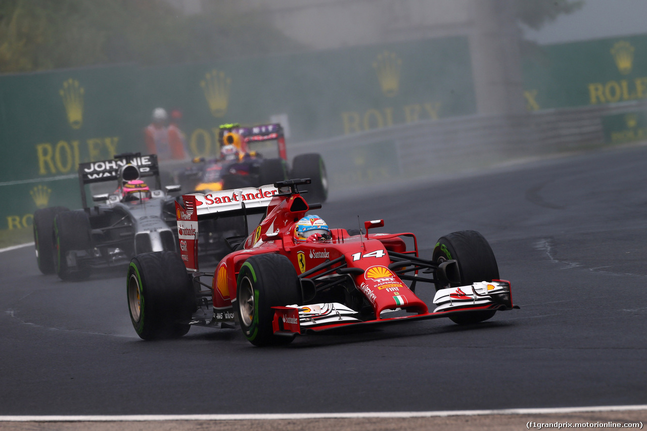 GP UNGHERIA, 27.07.2014- Gara, Fernando Alonso (ESP) Ferrari F14-T davanti a Jenson Button (GBR) McLaren Mercedes MP4-29
