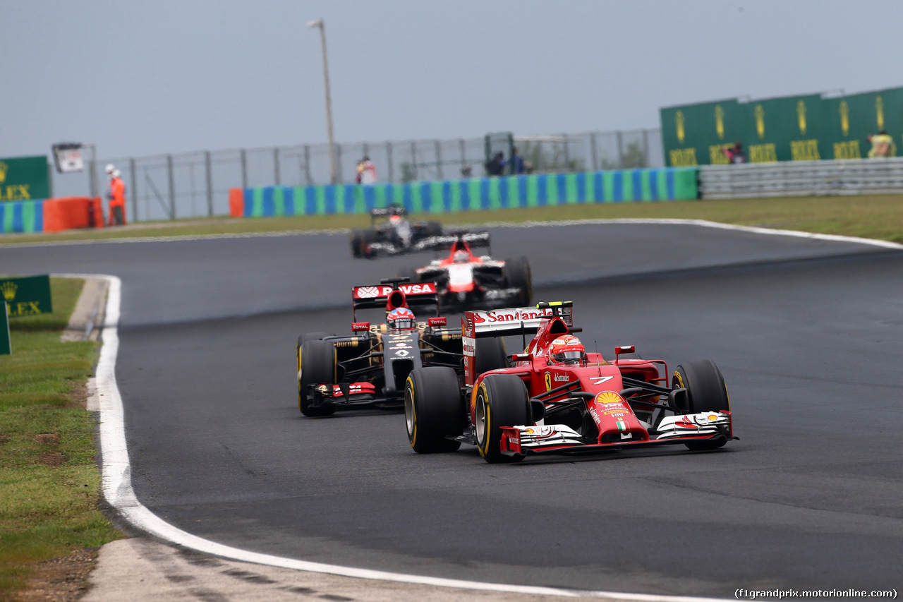 GP UNGHERIA, 27.07.2014- Gara, Kimi Raikkonen (FIN) Ferrari F14-T davanti a Romain Grosjean (FRA) Lotus F1 Team E22