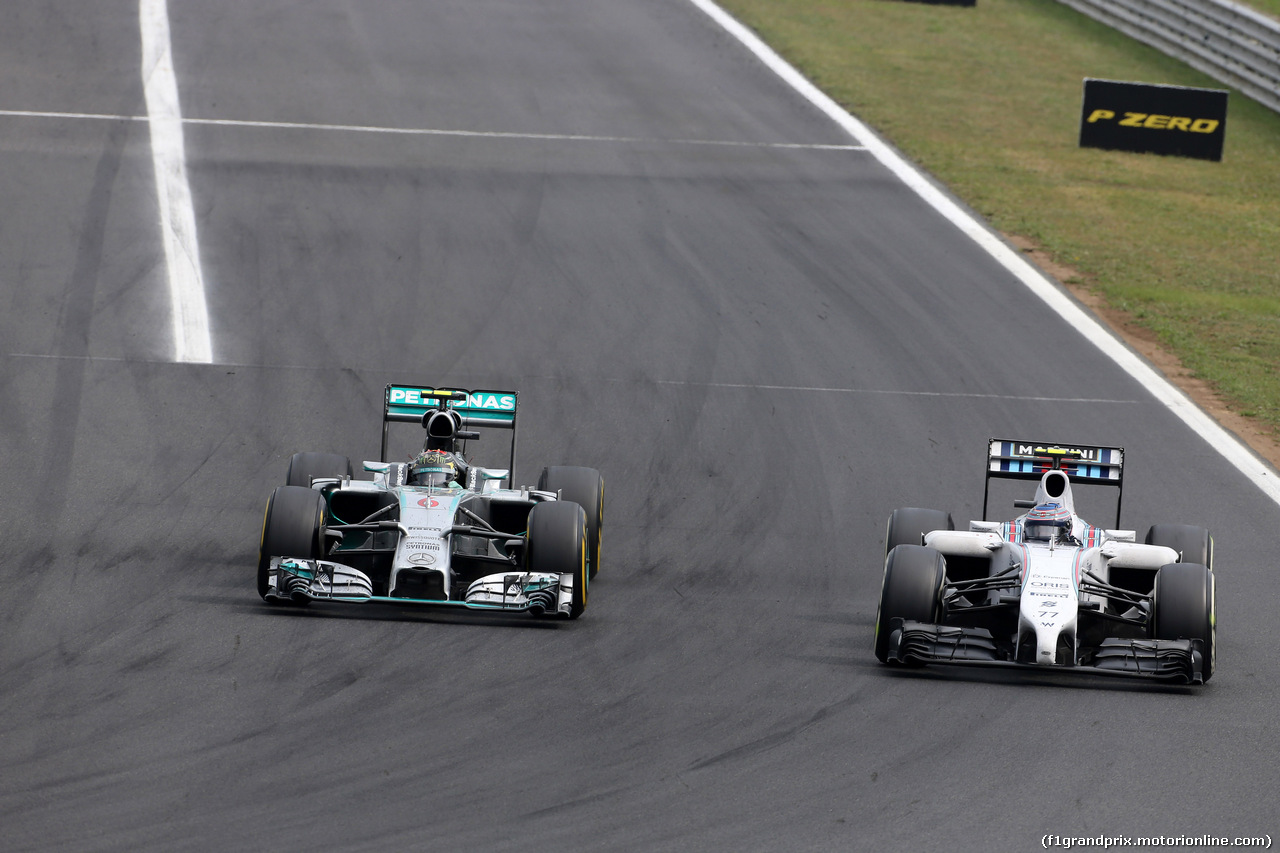 GP UNGHERIA, 27.07.2014- Gara, Nico Rosberg (GER) Mercedes AMG F1 W05 e Valtteri Bottas (FIN) Williams F1 Team FW36