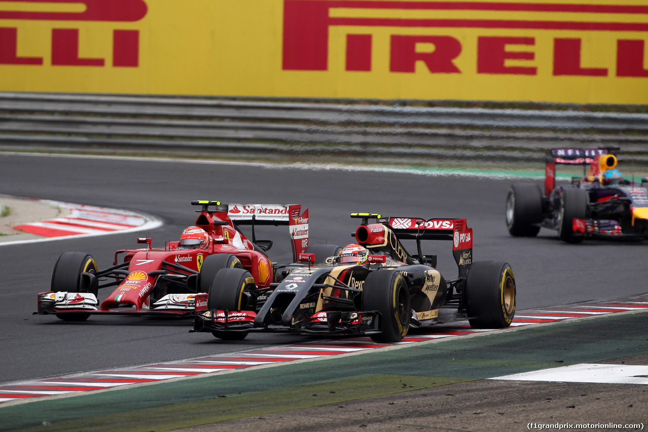 GP UNGHERIA, 27.07.2014- Gara, Pastor Maldonado (VEN) Lotus F1 Team E22 e Kimi Raikkonen (FIN) Ferrari F14-T
