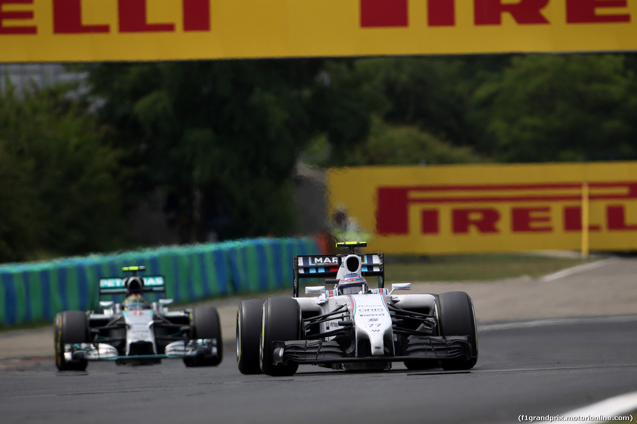 GP UNGHERIA, 27.07.2014- Gara, Valtteri Bottas (FIN) Williams F1 Team FW36 davanti a Nico Rosberg (GER) Mercedes AMG F1 W05