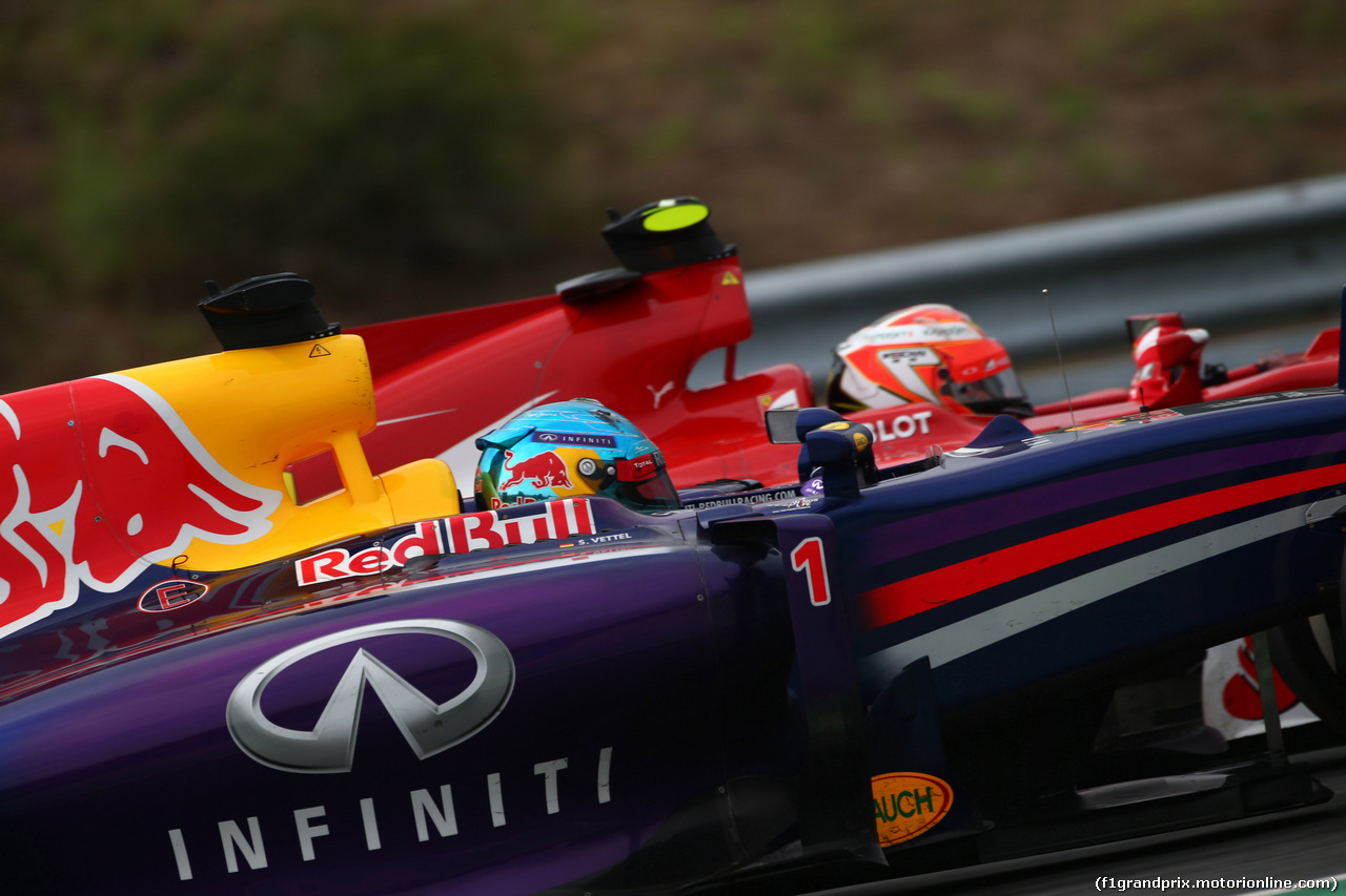 GP UNGHERIA, 27.07.2014- Gara, Sebastian Vettel (GER) Red Bull Racing RB10 e Kimi Raikkonen (FIN) Ferrari F14-T
