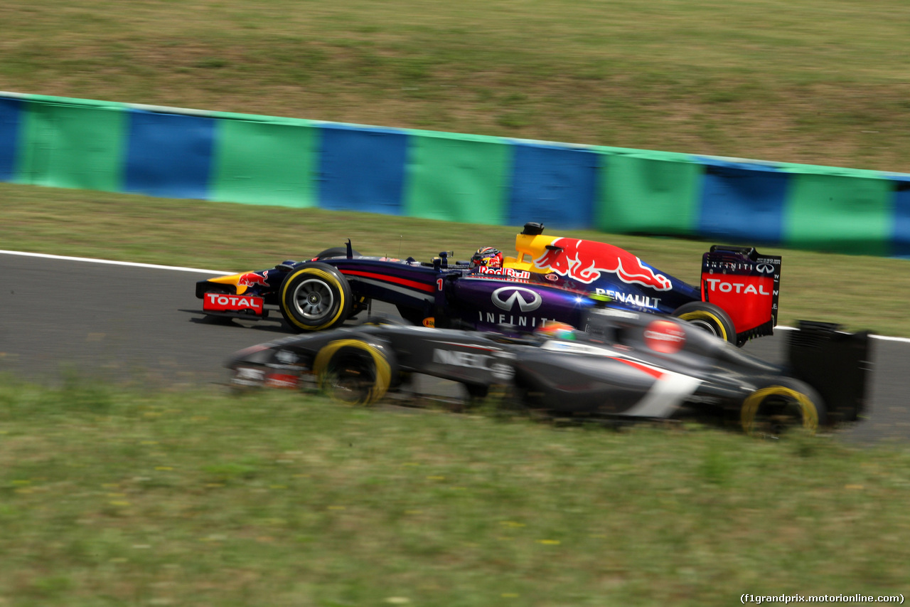 GP UNGHERIA, 26.07.2014- Prove Libere 3, Sebastian Vettel (GER) Red Bull Racing RB10 e Esteban Gutierrez (MEX), Sauber F1 Team C33