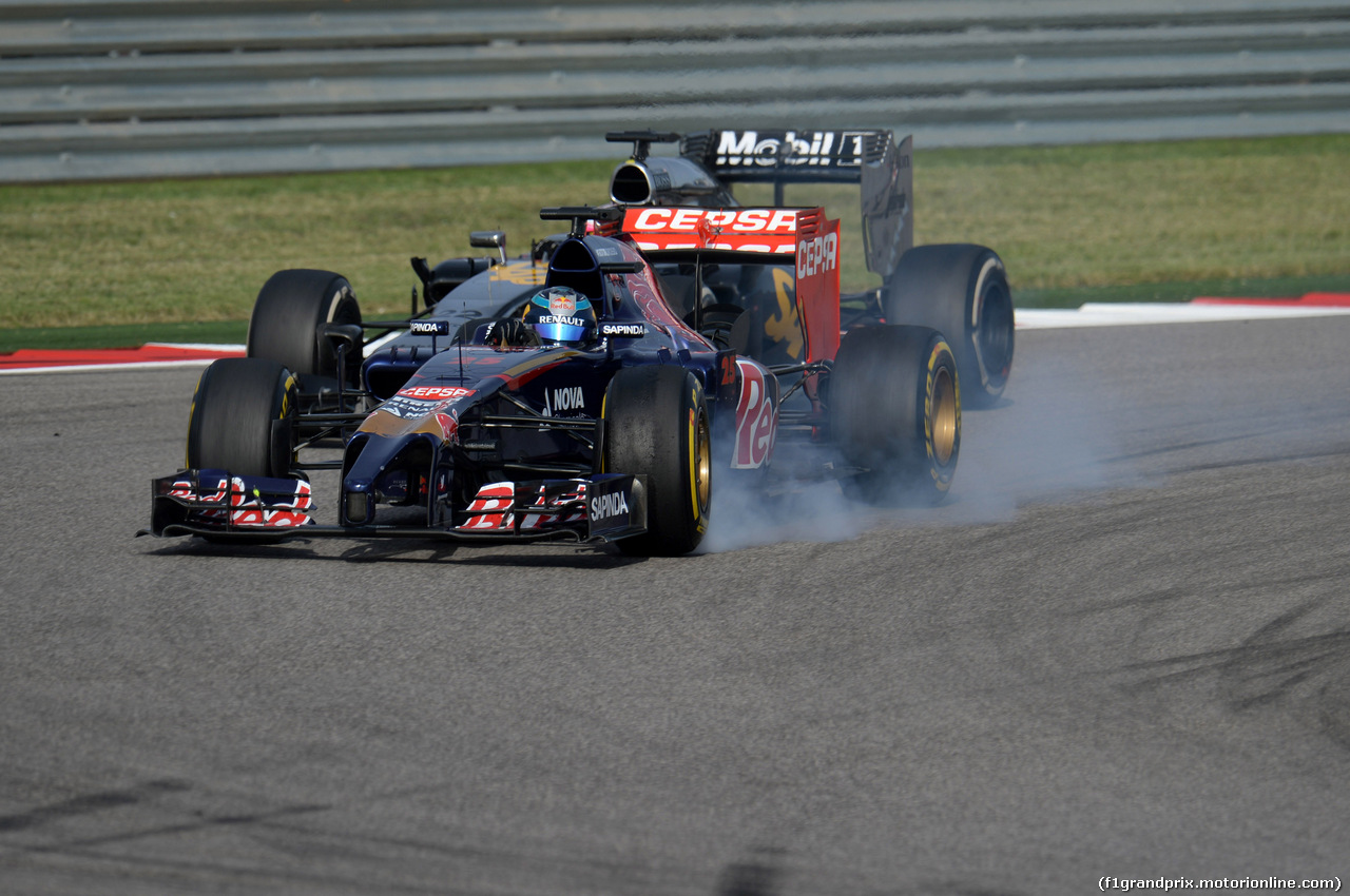 GP USA, 02.11.2014 - Gara, Jean-Eric Vergne (FRA) Scuderia Toro Rosso STR9 e Jenson Button (GBR) McLaren Mercedes MP4-29