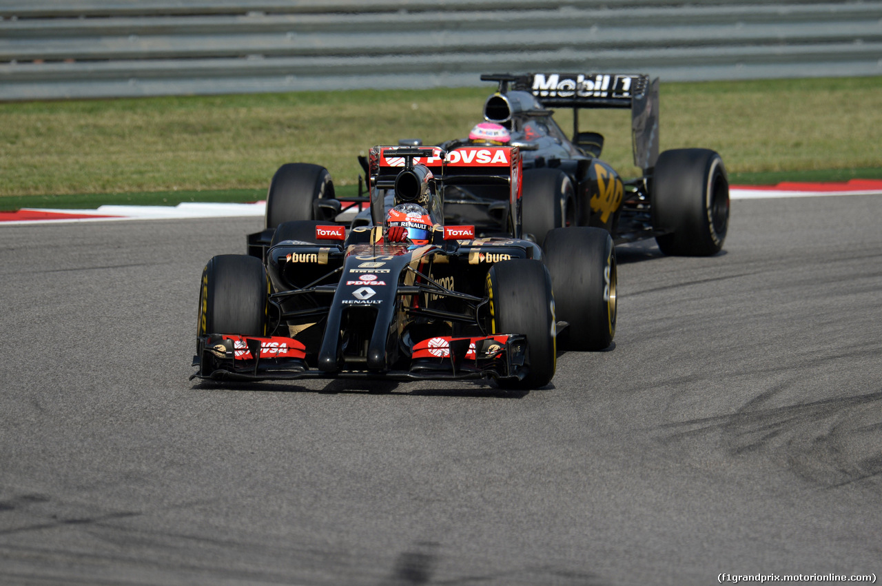 GP USA, 02.11.2014 - Gara, Romain Grosjean (FRA) Lotus F1 Team E22 e Jenson Button (GBR) McLaren Mercedes MP4-29