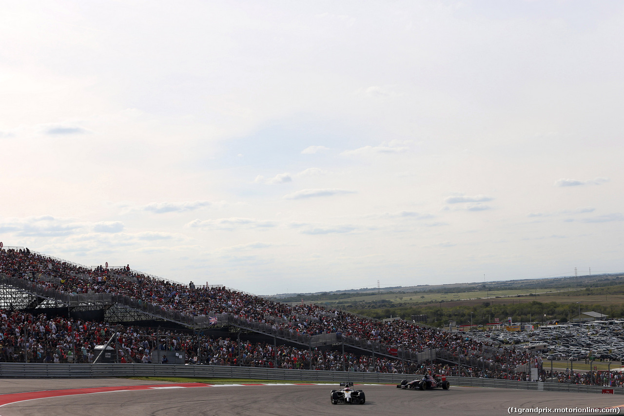 GP USA, 02.11.2014 - Gara, Jenson Button (GBR) McLaren Mercedes MP4-29 e Jean-Eric Vergne (FRA) Scuderia Toro Rosso STR9