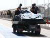TEST F1 BAHRAIN 02 MARZO, The Red Bull Racing RB10 of Sebastian Vettel (GER) Red Bull Racing is recovered back to the pits on the back of a truck.
02.03.2014. Formula One Testing, Bahrain Test Two, Day Four, Sakhir, Bahrain.
