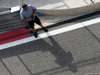 TEST F1 BAHRAIN 28 FEBBRAIO, A Pirelli technician on the pit wall.
28.02.2014. Formula One Testing, Bahrain Test Two, Day Two, Sakhir, Bahrain.