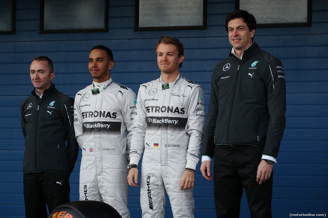TEST F1 JEREZ 28 GENNAIO, (L to R): Paddy Lowe (GBR) Mercedes AMG F1 Executive Director (Technical); Lewis Hamilton (GBR) Mercedes AMG F1; Nico Rosberg (GER) Mercedes AMG F1; e Toto Wolff (GER) Mercedes AMG F1 Shareholder e Executive Director, at the unveiling of the new Mercedes AMG F1 W05.
28.01.2014. Formula One Testing, Day One, Jerez, Spain.