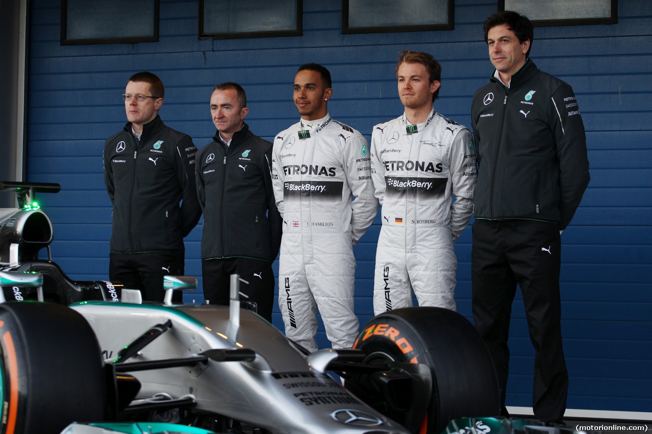 TEST F1 JEREZ 28 GENNAIO, (L to R): Paddy Lowe (GBR) Mercedes AMG F1 Executive Director (Technical); Lewis Hamilton (GBR) Mercedes AMG F1; Nico Rosberg (GER) Mercedes AMG F1; e Toto Wolff (GER) Mercedes AMG F1 Shareholder e Executive Director, at the unveiling of the new Mercedes AMG F1 W05.
28.01.2014. Formula One Testing, Day One, Jerez, Spain.