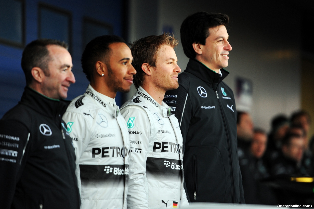 TEST F1 JEREZ 28 GENNAIO, (L to R): Paddy Lowe (GBR) Mercedes AMG F1 Executive Director (Technical); Lewis Hamilton (GBR) Mercedes AMG F1; Nico Rosberg (GER) Mercedes AMG F1; e Toto Wolff (GER) Mercedes AMG F1 Shareholder e Executive Director, at the unveiling of the new Mercedes AMG F1 W05.
28.01.2014. Formula One Testing, Day One, Jerez, Spain.