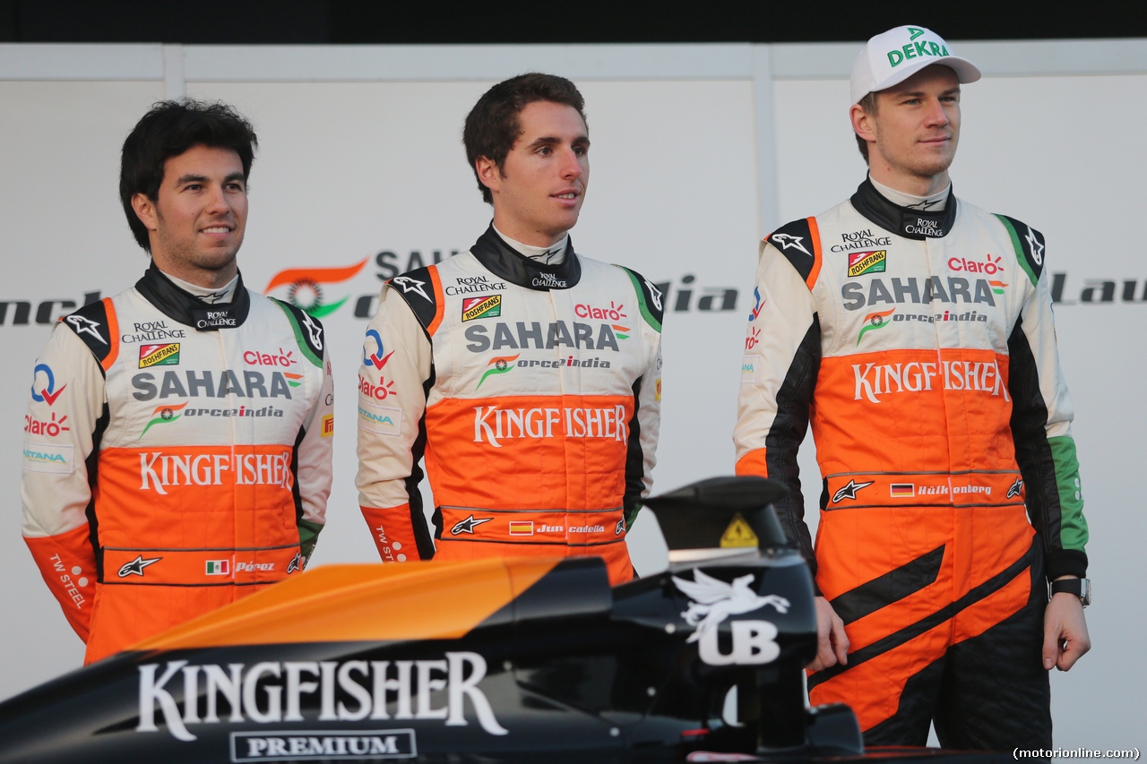 TEST F1 JEREZ 28 GENNAIO, (L to R): Sergio Perez (MEX) Sahara Force India F1 with Daniel Juncadella (ESP) Sahara Force India F1 Team Test e Reserve Driver; e Nico Hulkenberg (GER) Sahara Force India F1 at the launch of the Sahara Force India F1 VJM07.
28.01.2014. Formula One Testing, Day One, Jerez, Spain.