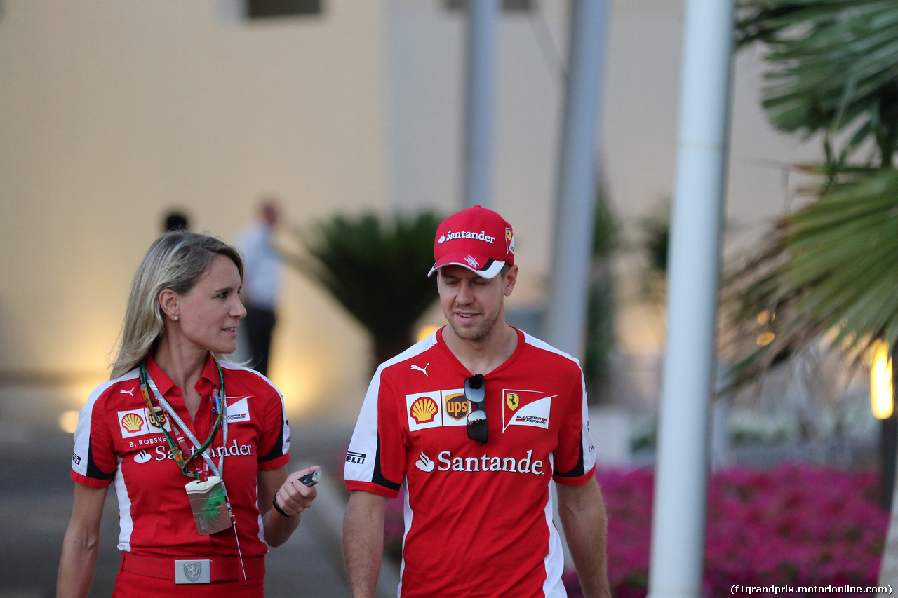 GP ABU DHABI, 28.11.2015 - Britta Roeske (AUT) Ferrari Press Officer. e Sebastian Vettel (GER) Ferrari SF15-T