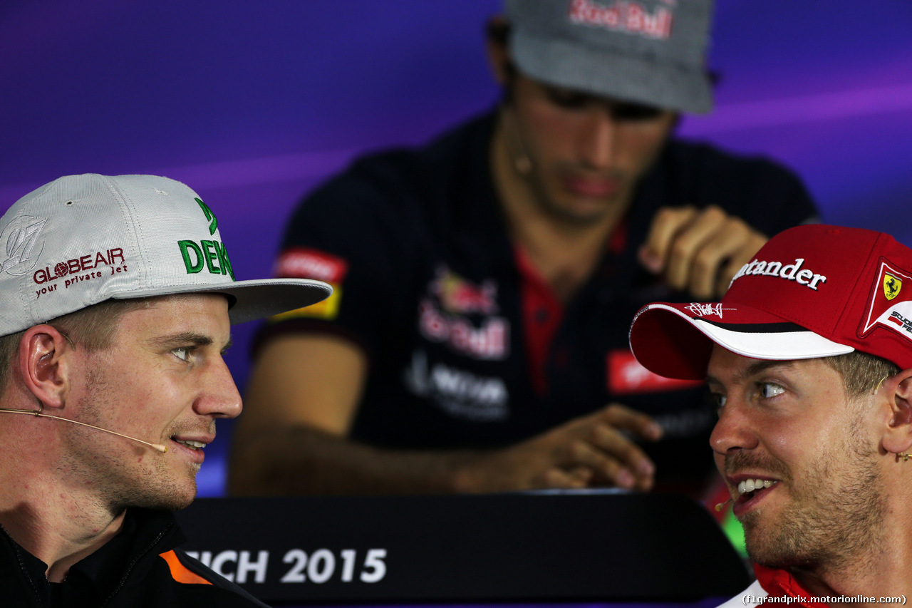 GP AUSTRIA, (L to R): Nico Hulkenberg (GER) Sahara Force India F1 with Sebastian Vettel (GER) Ferrari in the FIA Press Conference.
18.06.2015.