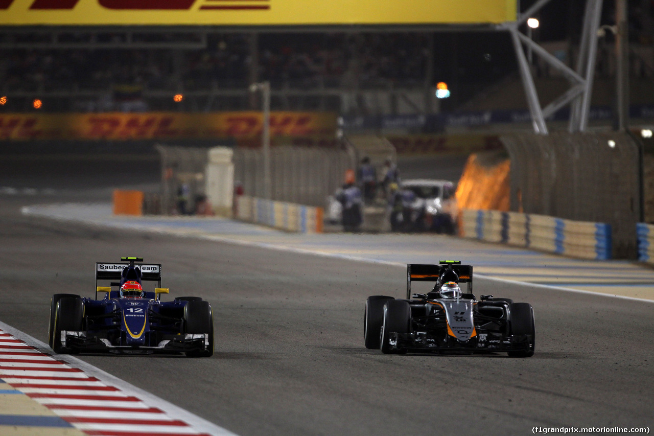 GP BAHRAIN, 19.04.2015 - Gara, Felipe Nasr (BRA) Sauber C34 e Sergio Perez (MEX) Sahara Force India F1 VJM08