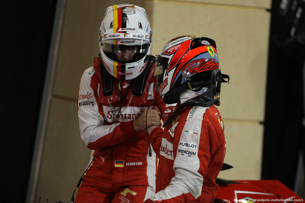 GP BAHRAIN, 18.04.2015 - Qualifiche, secondo Sebastian Vettel (GER) Ferrari SF15-T e Kimi Raikkonen (FIN) Ferrari SF15-T