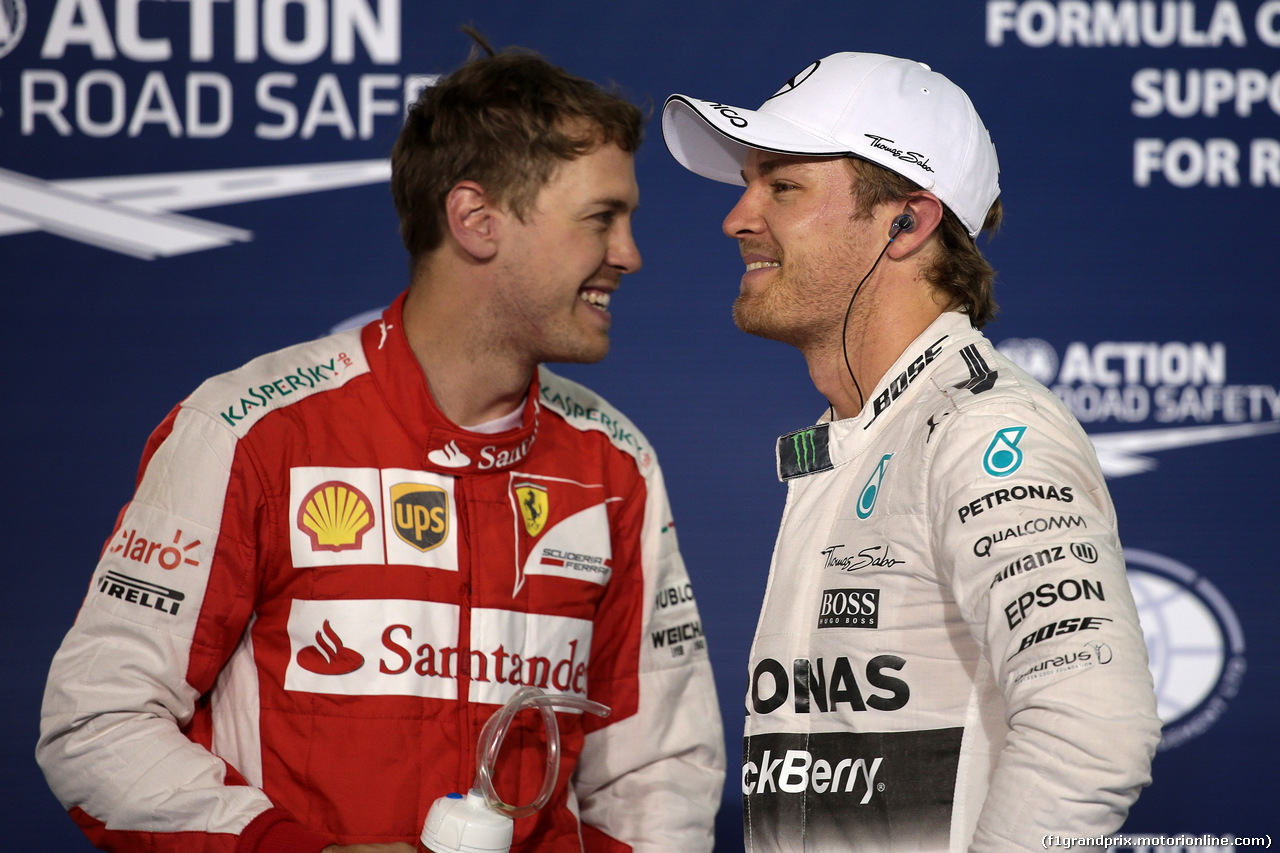 GP BAHRAIN, 18.04.2015 - Qualifiche, secondo Sebastian Vettel (GER) Ferrari SF15-T e terzo Nico Rosberg (GER) Mercedes AMG F1 W06