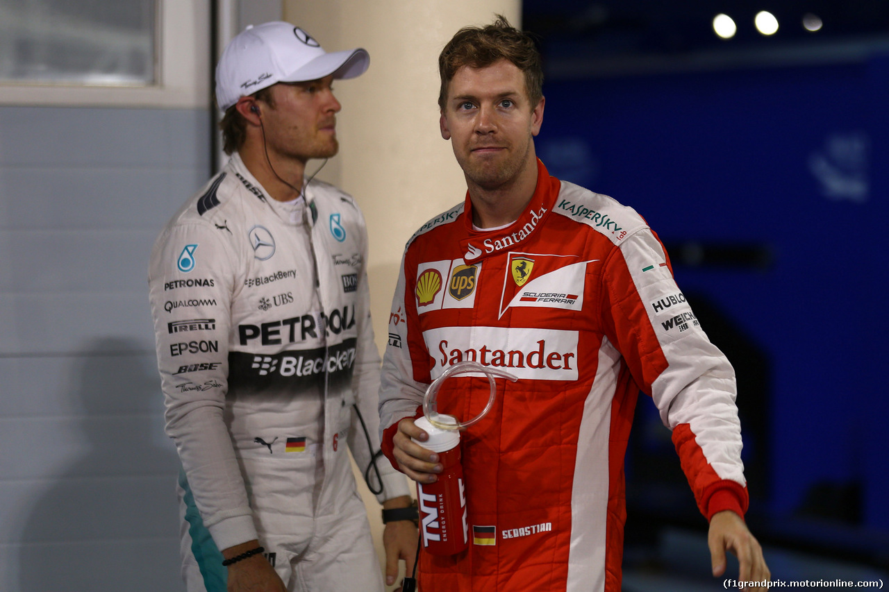 GP BAHRAIN, 18.04.2015 - Qualifiche, terzo Nico Rosberg (GER) Mercedes AMG F1 W06 e secondo Sebastian Vettel (GER) Ferrari SF15-T